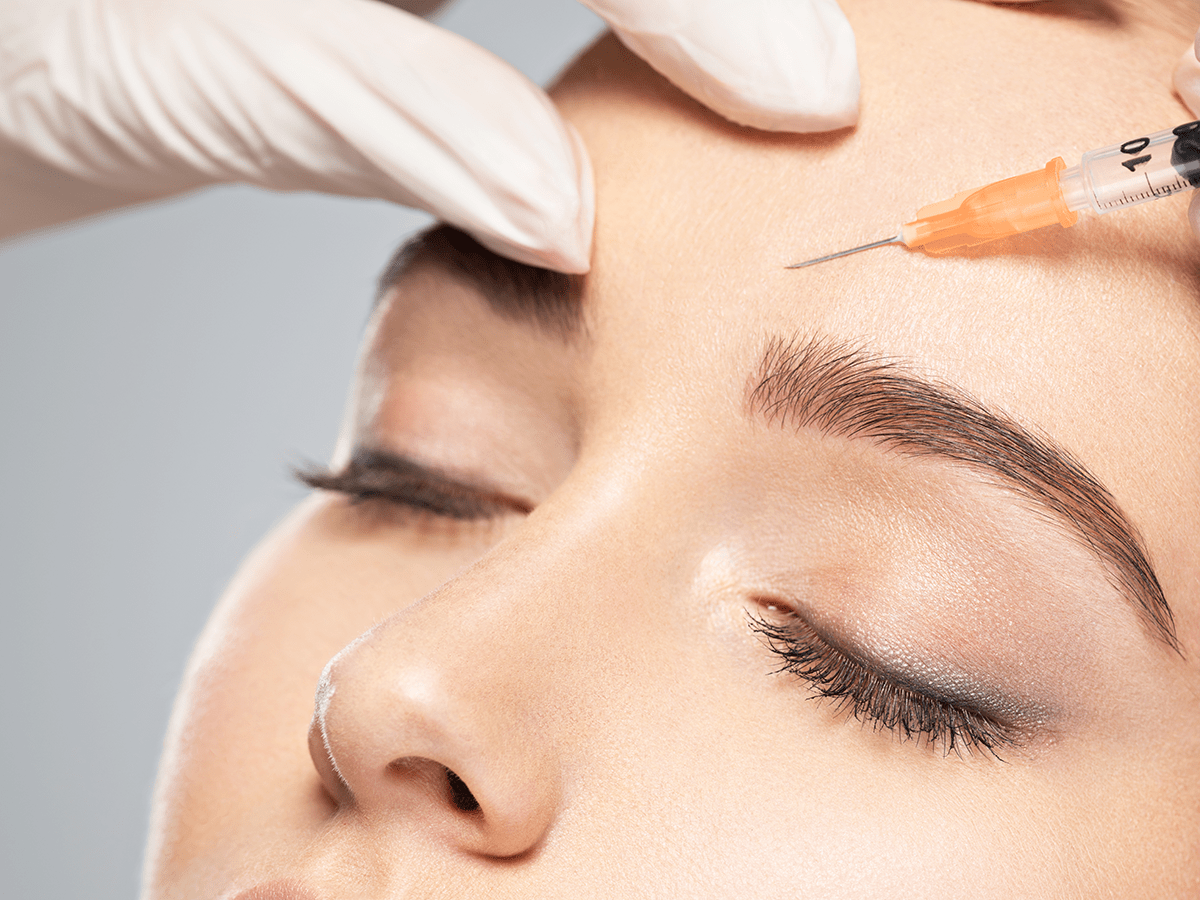 model getting botox on forehead