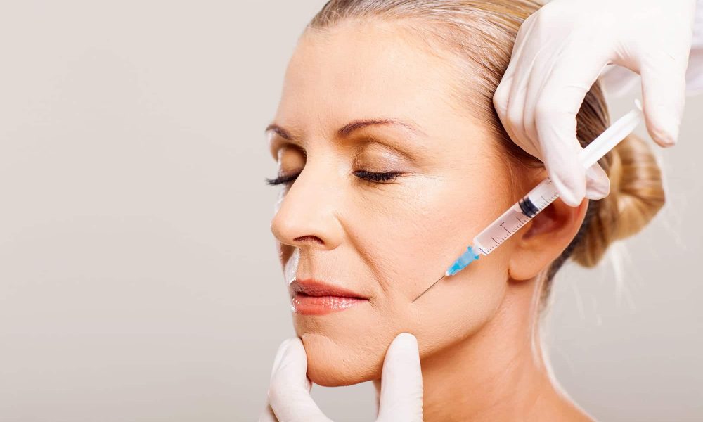chin filler on client